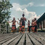 Cultural dance performance in traditional attire in West Kalimantan, Indonesia.